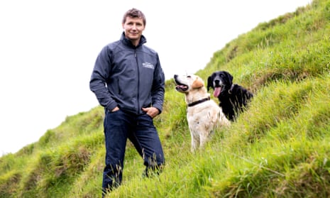 Mathew Ward with his own dogs, Suki (left) and Pepper