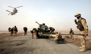A 105mm gun is dropped by helicopter to British troops on the Fao peninsula in southern Iraq in March 2003.