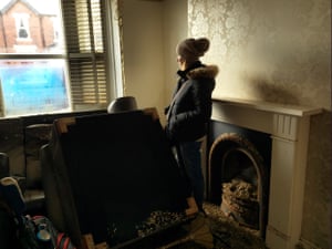 Anne Thomson stands in her front room with debris from the water scattered as a remnant. ‘Within an hour the water in our home went from zero to five foot high. The house is now worth nothing.”