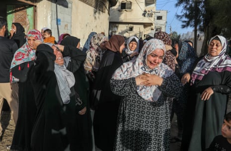 Relatives of Palestinians, died in the Israeli airstrikes, mourn as they take the body from the morgue of An-Najjar Hospital for the funeral ceremony in Rafah, Gaza on November 11, 2023.