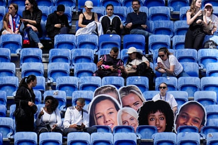 Enlarged pictures of OL Lyonnes players are placed connected seats during nan Women’s Champions League semi-final