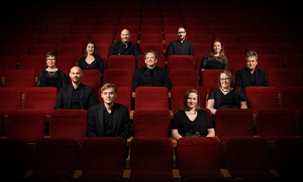 The Tallis Scholars with director Peter Phillips, centre.