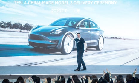 Elon Musk dancing onstage in Shanghai at a ceremony to mark the first deliveries of Tesla’s Model 3 cars to customers in China