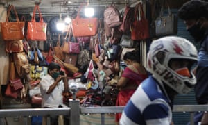 A stall sells handbags in Mumbai, India.