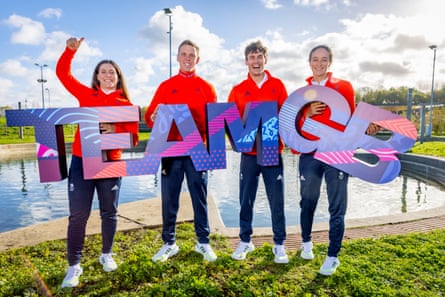 Paris 2024 Team GB canoe slalom team announcement group photo featuring left to right: Kimberley Woods, Joe Clarke, Adam Burgess and Mallory Franklin at Lee Valley White Water Centre.