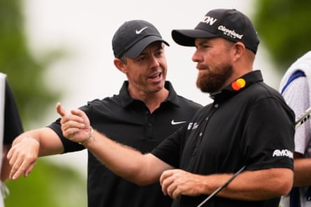 Rory McIlroy talks with Shane Lowry during the Zurich Classic in New Orleans in April.
