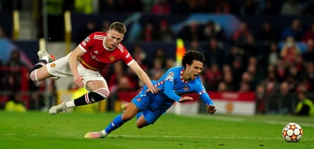 Scott McTominay (left) and Atlético Madrid’s João Félix head for the turf on Tuesday.