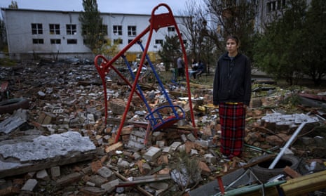 Taisiia Kovaliova, 15, stands amongst the rubble of a playground in front of her house hit by a Russian missile in Mykolaiv.