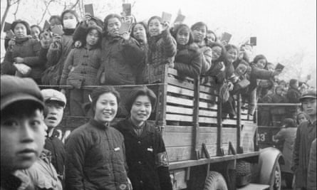 Red Guards brandishing copies of Mao’s Little Red Book, as they parade in Beijing’s streets during the Cultural Revolution, launched in 1966.