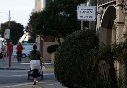 An apartment for rent sign hangs outside a building in San Francisco, California.