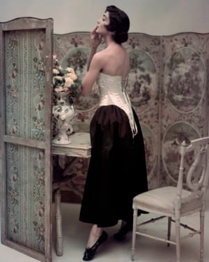 Carmen Dell’Orefice wearing a corset in Vogue, 1947