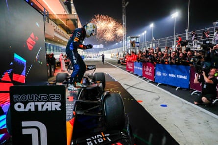 Max Verstappen celebrates with his Red Bull team after winning in Qatar last year.