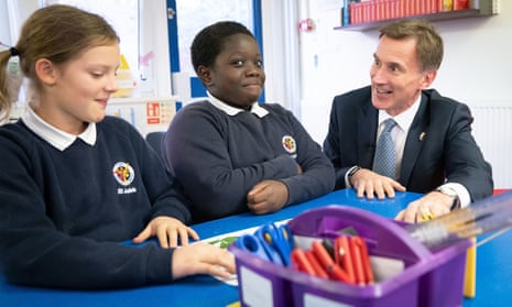 Chancellor  Jeremy Hunt meets pupils at St Jude’s Church of England Primary School in south London after delivering his autumn statement.