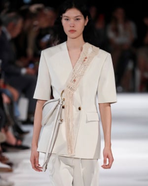 Double-breasted blazers come with elbow-length sleeves