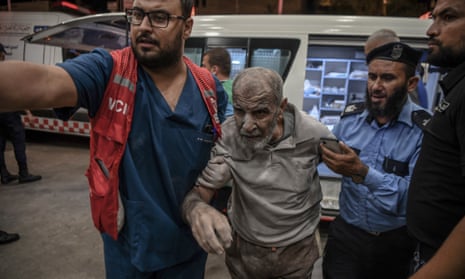 A Palestinian man arrives at Nasser Hospital in Khan Yunis, Gaza after an Israeli strike.