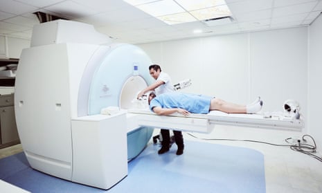 A patient being prepared for a scan
