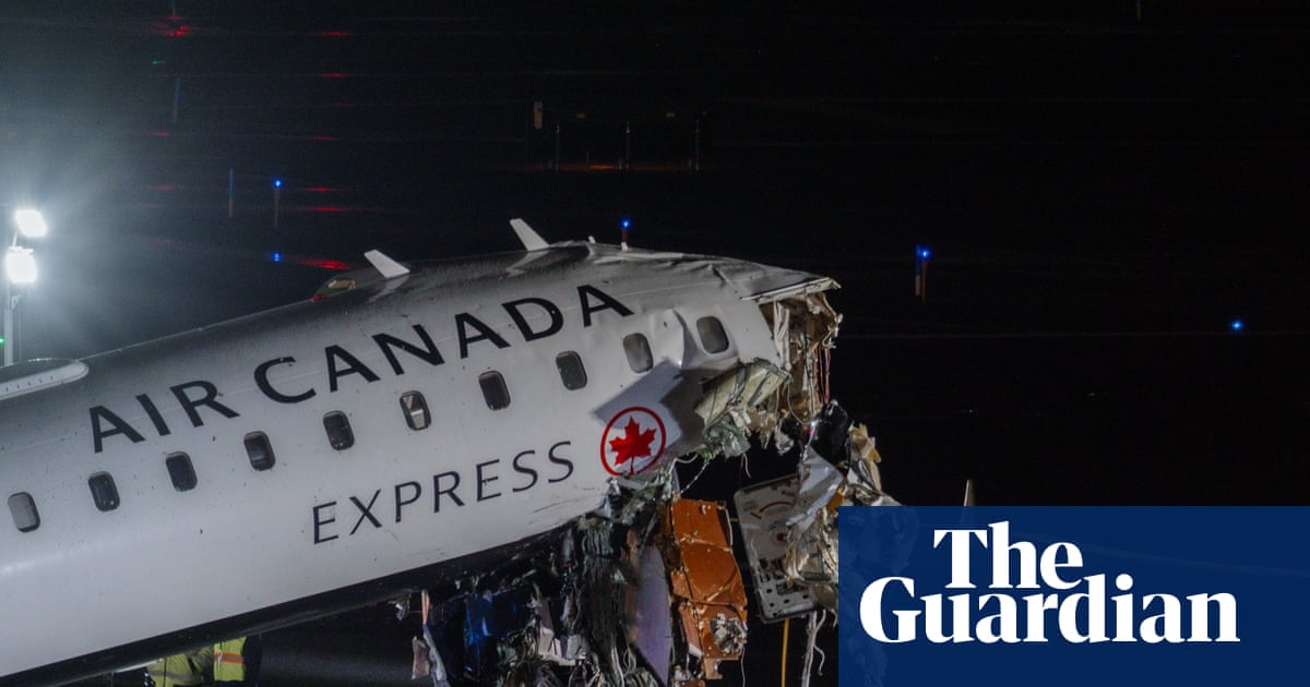 Two pilots killed after plane collision at New York's LaGuardia airport – video