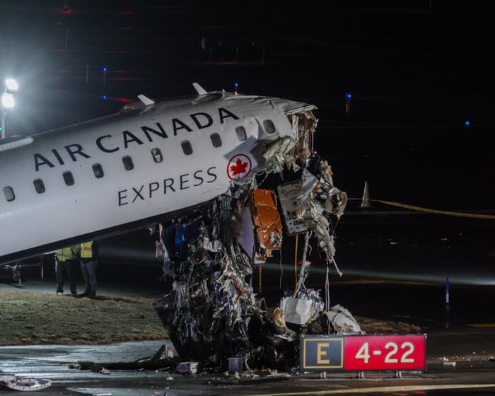 Two pilots killed after plane collision at New York's LaGuardia airport – video