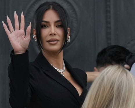 Kim Kardashian waving