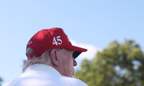 trump in red hat that says '45' on the side