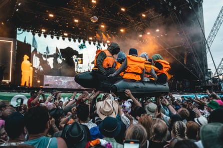 The migrant boat artwork by Banksy during Little Simz’s set.