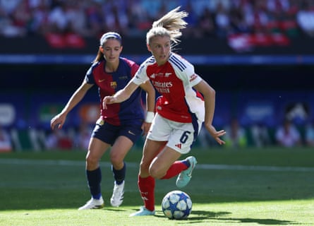 Arsenal’s Leah Williamson in action with Barcelona’s Aitana Bonmatí