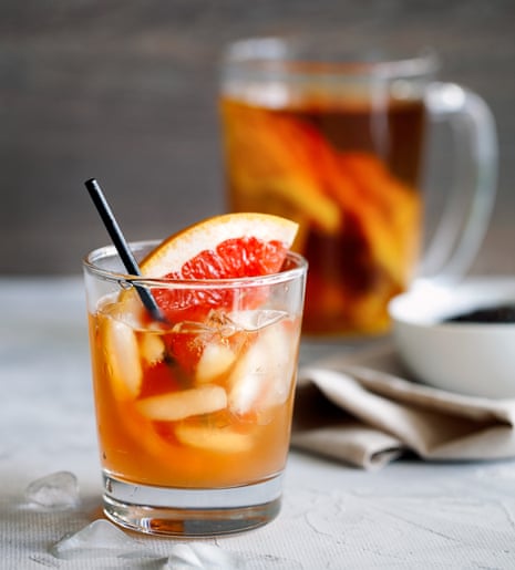 Kombucha tea with a slice of grapefruit and ices. Kombucha mushroom tea is a natural fermented drink originally from China.