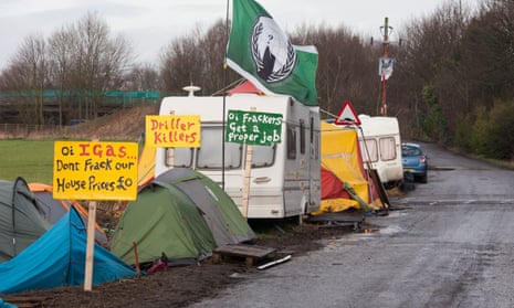 tents, a caravan and placards at Barton Moss anti-fracking camp