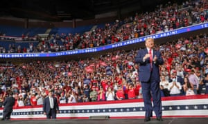 Donald Trump arrives onstage at a rally in Tulsa, Oklahoma, on 20 June.