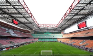 Milan play Genoa in an empty stadium in Serie A.