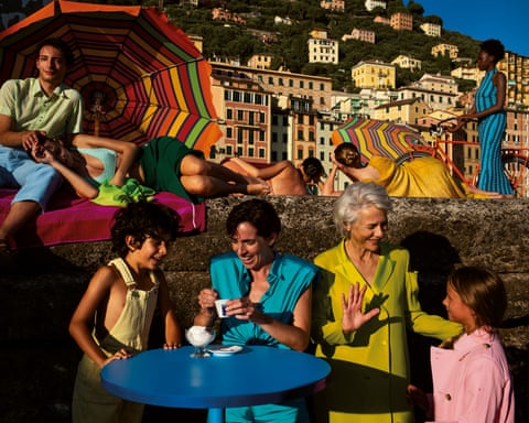 A sunny scene with people of different ages