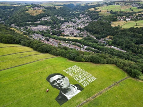 A picture of a land portrait of Andy Burnham near Hebden Bridge in Yorkshire, with a slogan urging him to reverse aid cuts. It was commissioned by the humanitarian organisation Concern Worldwide.