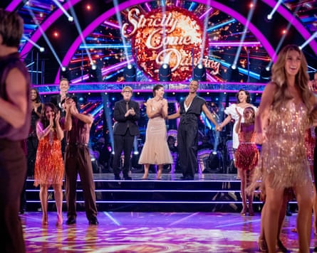 Presenters stood behind dancers on the stage