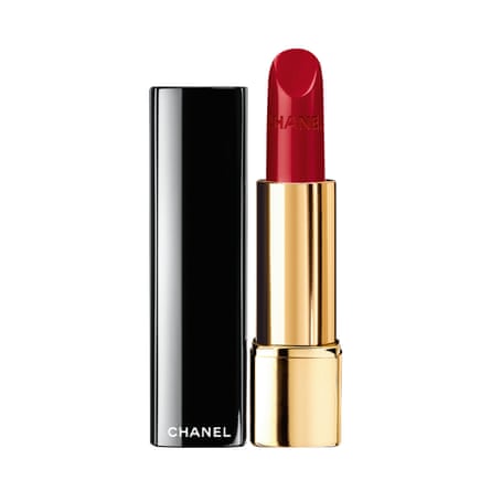 Red Chanel Rouge Allure lipstick next to its cover