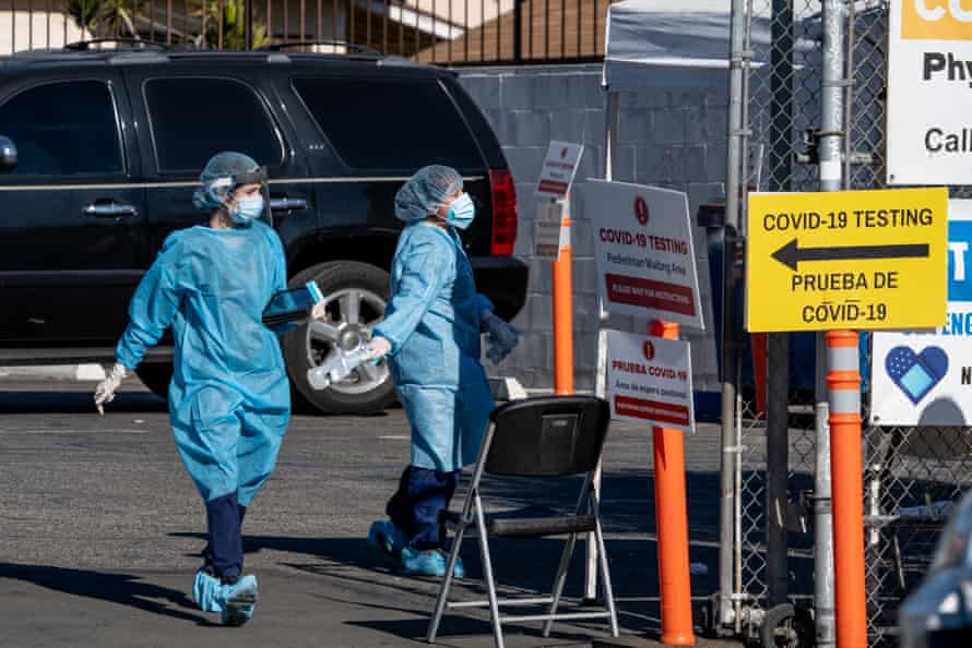 Health workers are found at a Florence medical clinic where corona virus tests are administered.