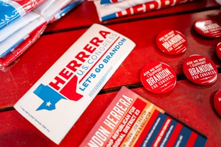 Campaign pins and flyers for Brandon Herrera on a table
