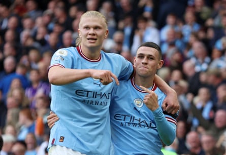 Erling Haaland and Phil Foden celebrate during Manchester City’s 6-3 thrashing of Manchester United in 2022. Haaland and Foden both scored hat-tricks