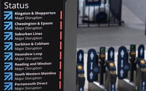 Waterloo station, London: a train departures board shows significant disruption