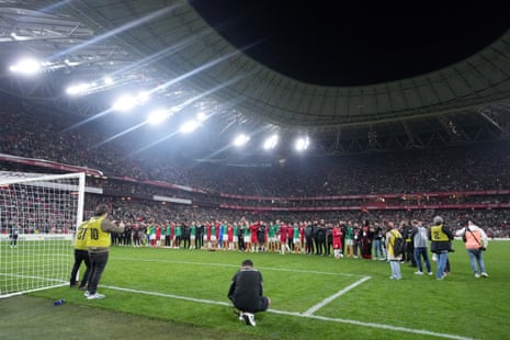 A general view of the inside of the stadium as players of Palestine acknowledge the fans at full-time