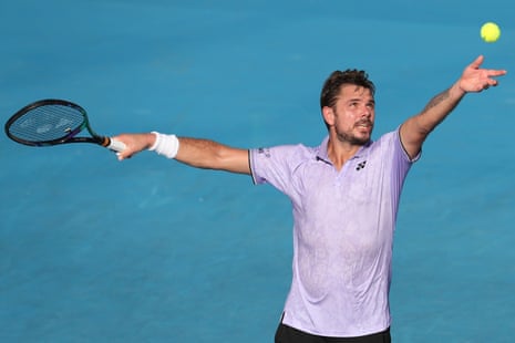 Stan Wawrinka tosses to serve in his match against Alex Molcan of Slovakia.