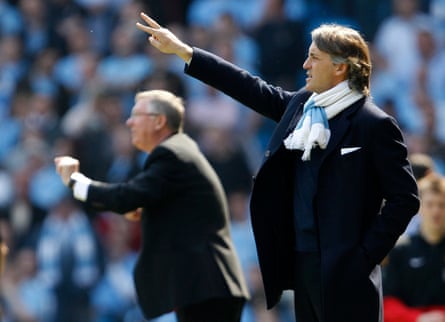 Roberto Mancini and Sir Alex Ferguson in 2009