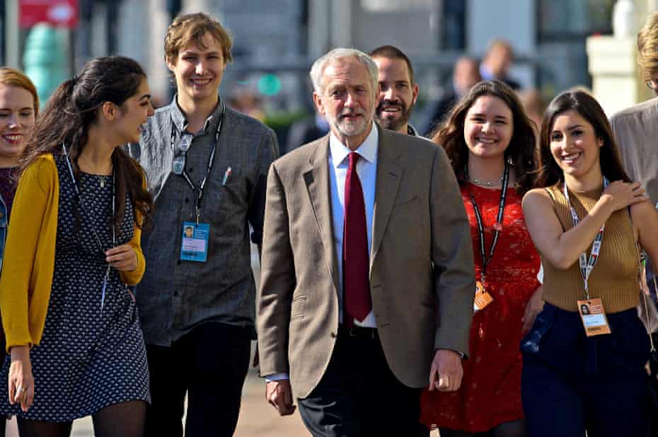Jeremy Corbyn is flanked by supporters as he arrives to deliver his key note speech at Labour’s autumn conference in Brighton