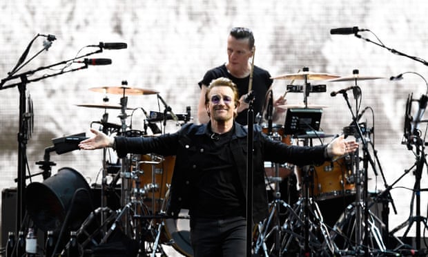 Risk takers ... Bono of U2 with Larry Mullen Jr at Twickenham Stadium on Saturday.