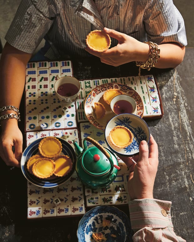 Many custard tarts on a bowl