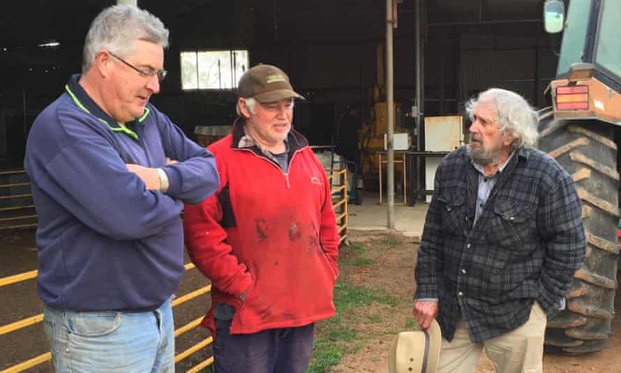 Farmers Glenn Crees, Murray Giles and George Giraudo at the shearing shed on Crees’s property near Merredin, Western Australia. They are among the 11 farmers who allowed Collgar to construct wind turbines on their properties.