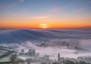 A view of Glastonbury, UK, on cold January morning from Glastonbury Tor at sunrise