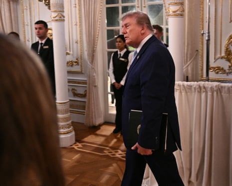 Donald Trump walking to a podium at his Mar-A-Lago resort in Florida