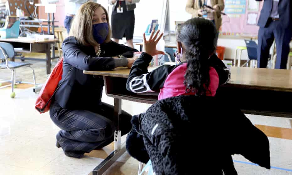 Oregon governor Kate Brown talks with a first-grader in Portland, Oregon.