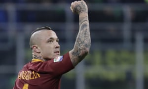 Roma’s Radia Nainggolan celebrates after scoring his second screamer against Inter.