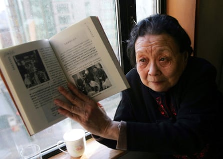 Gao with a book she wrote about Aids, in Beijing, 2007.